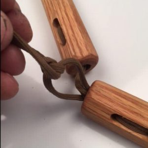 Tie the open ends to a double knot. "box knot"